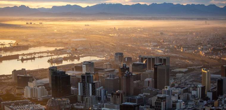 A city skyline at dawn